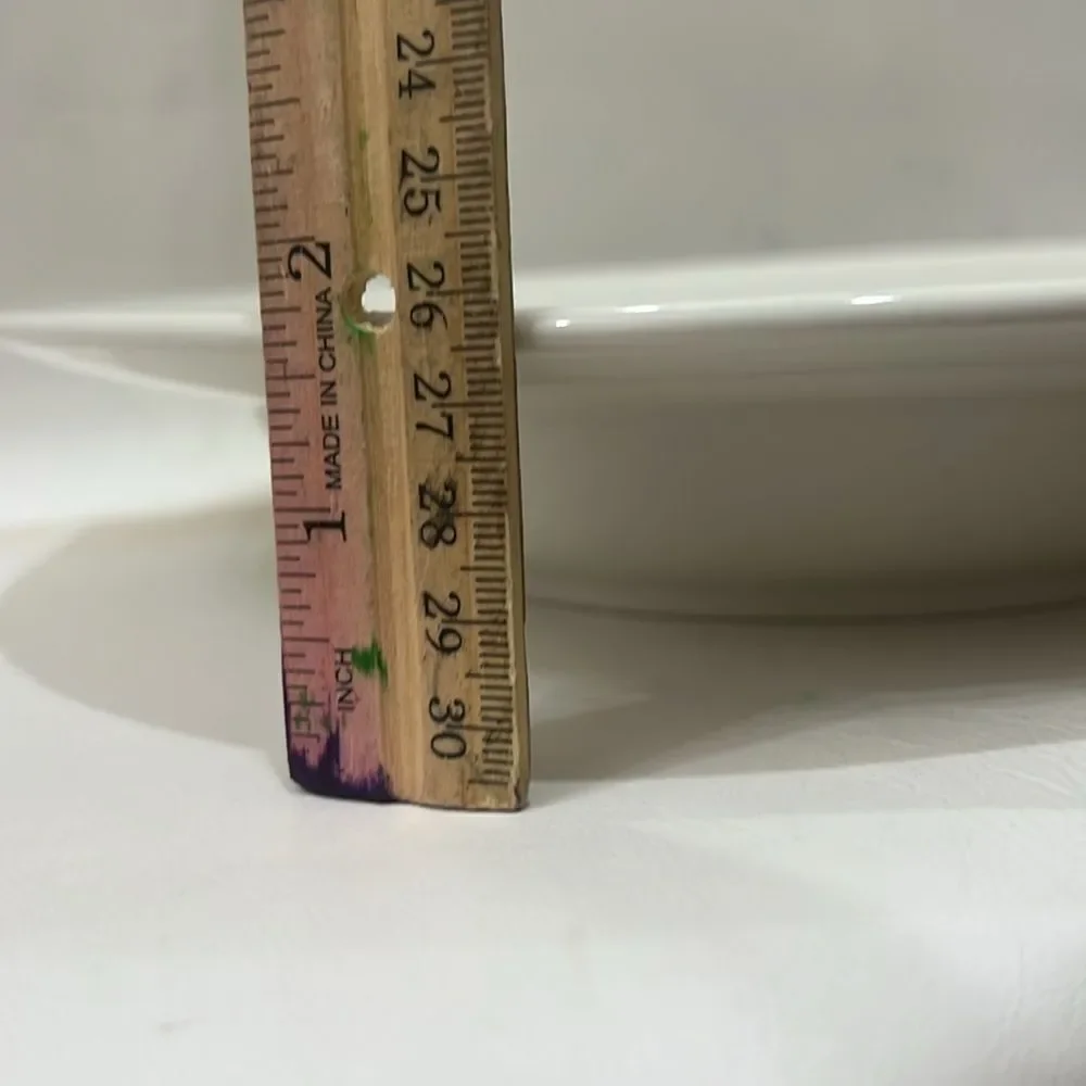 Mikasa inches tall
