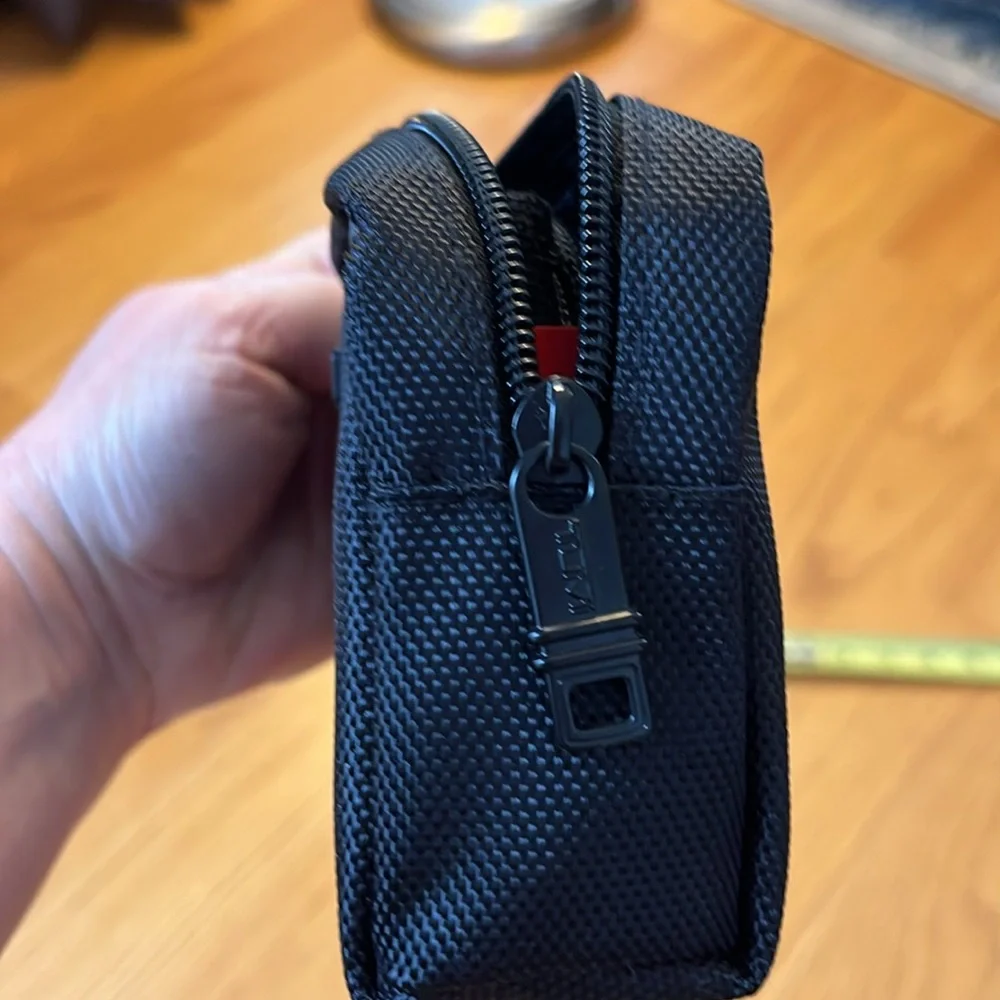 Tumi for Delta small black bag with sleep mask and socks