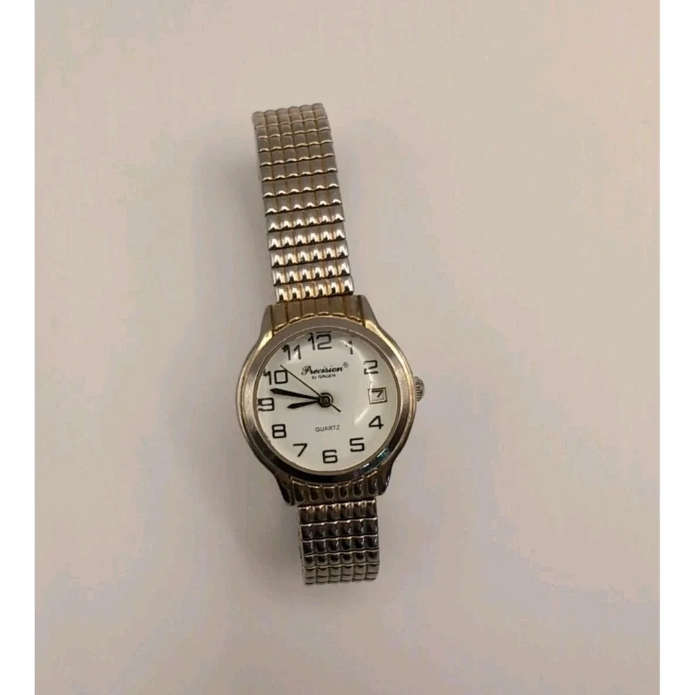PRECISION Wristwatch GP435L DATE washed gold-tone STEEL FLEXBAND New‎ battery