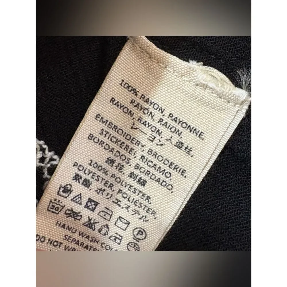 Free People black diamond embroidered sleeveless tank top