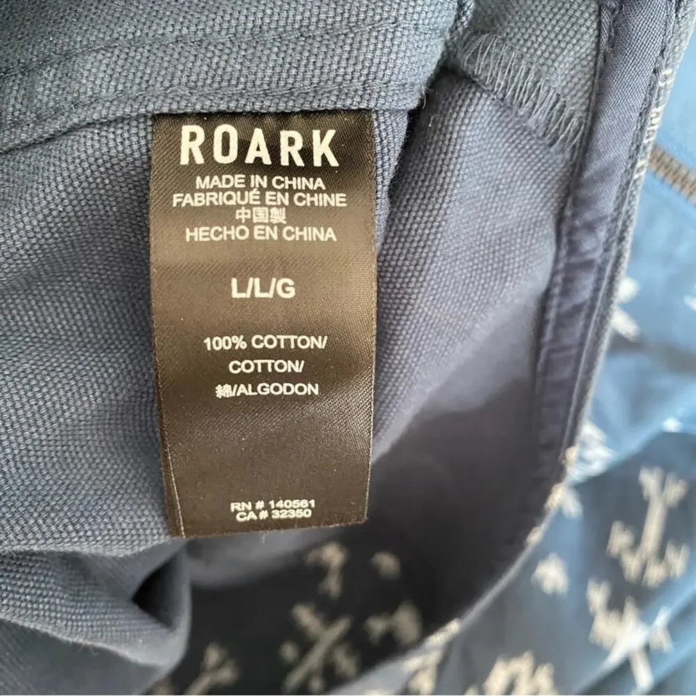 Roark laying jumpsuit across