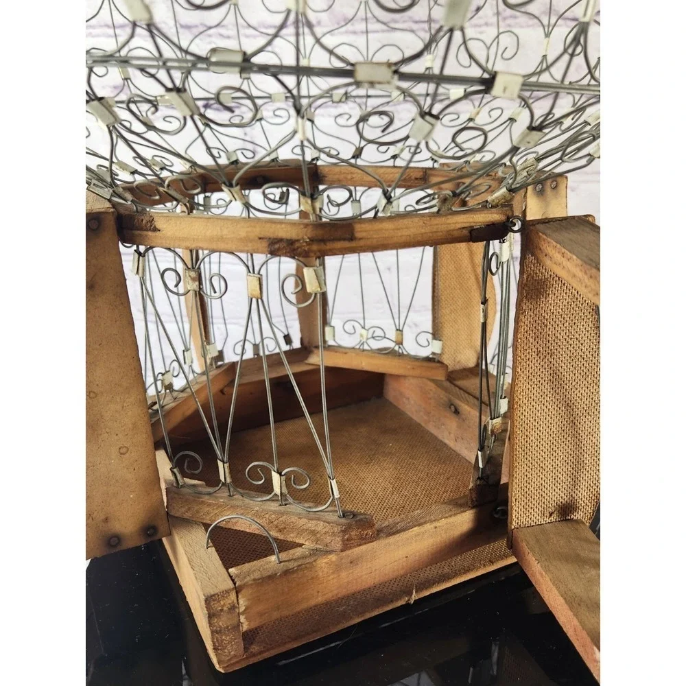 Bird by Juicy Couture this antique
