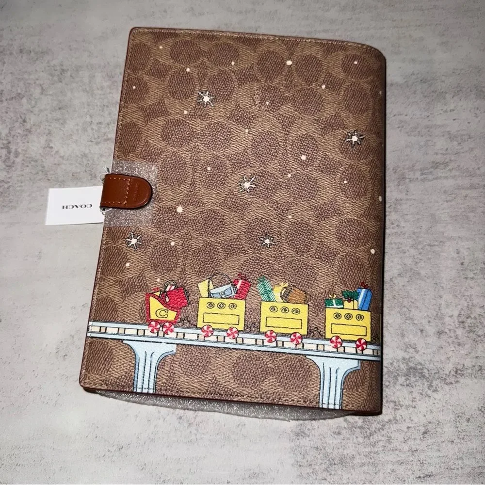 Coach charming notebook
