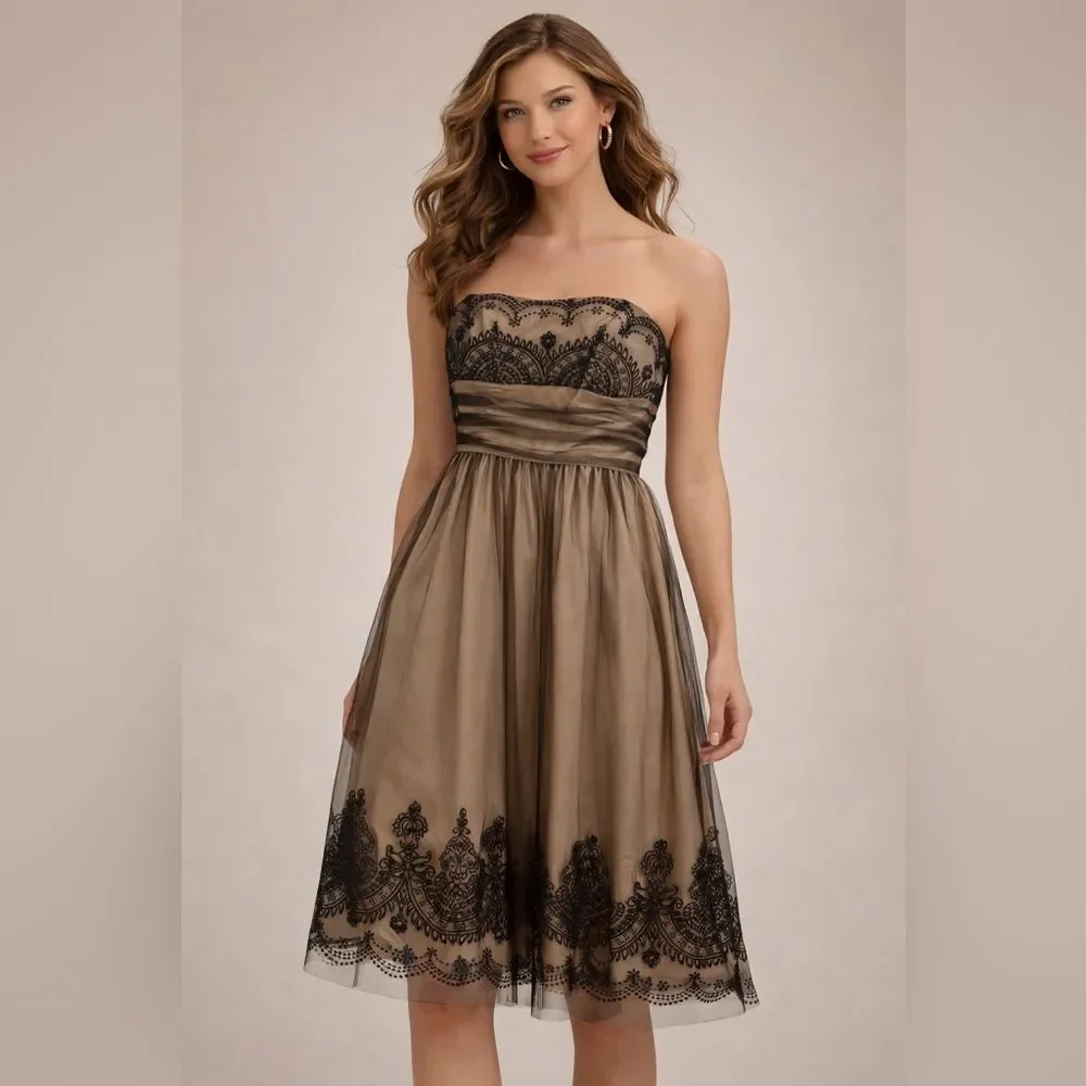David’s bridal strapless dress with bead detail and sparkle. Worn once. EUC