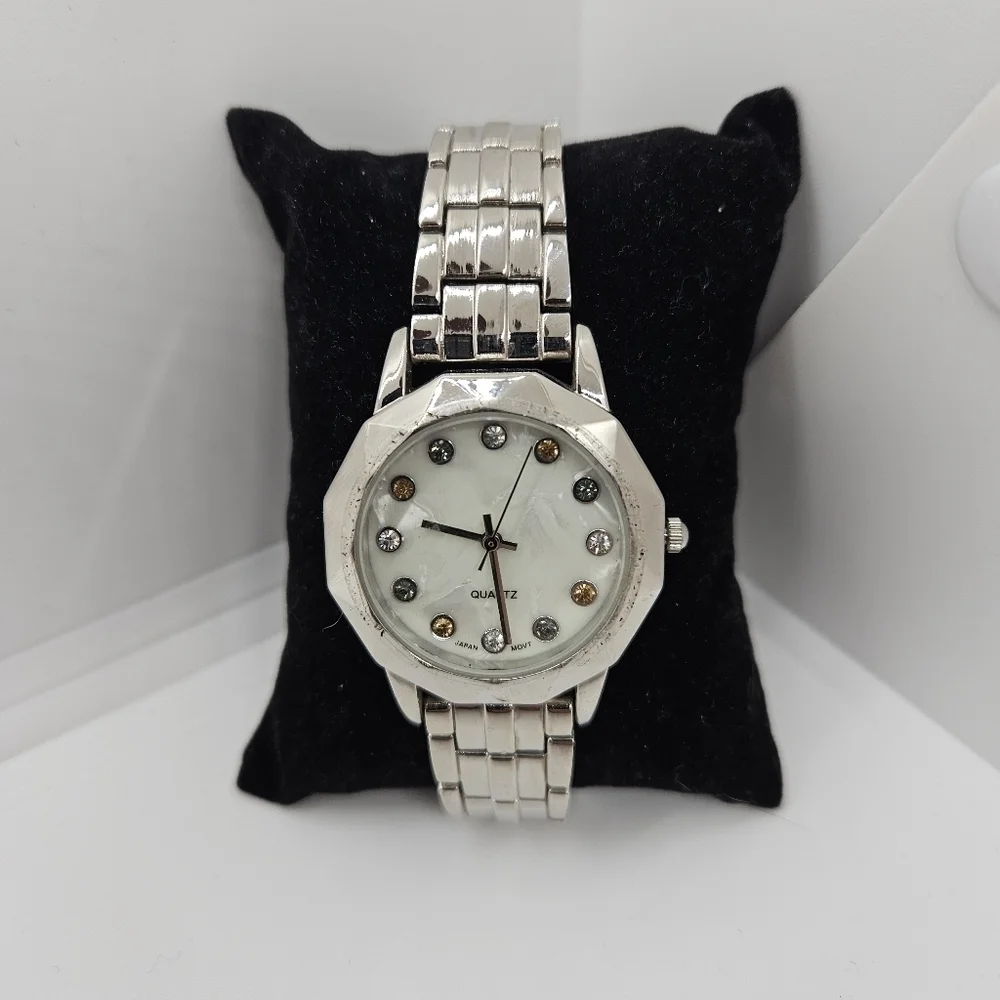 silver tone watch with rhinestone digits