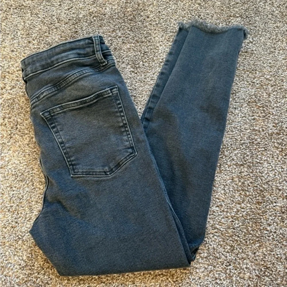 Free People We The Free high waisted cropped skinny jeans stretch raw hem black