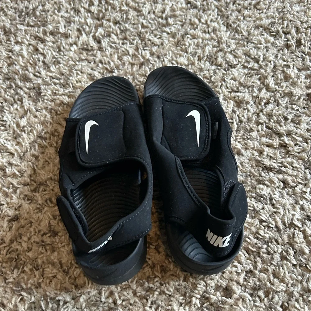 Nike Kids Black Slide Sandals with White Swoosh Accent