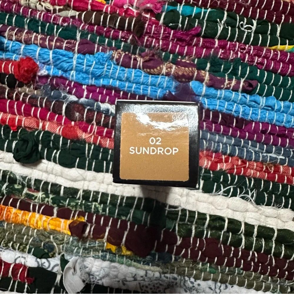 laura mercier achieve sun