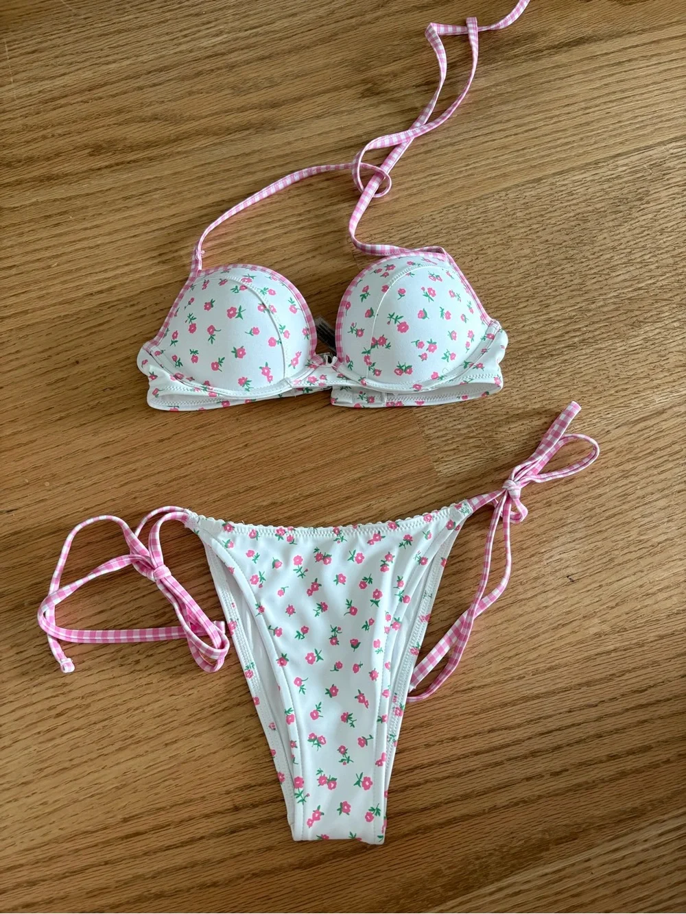 Frankie’s Bikinis White Bikini Set with Pink Floral accents