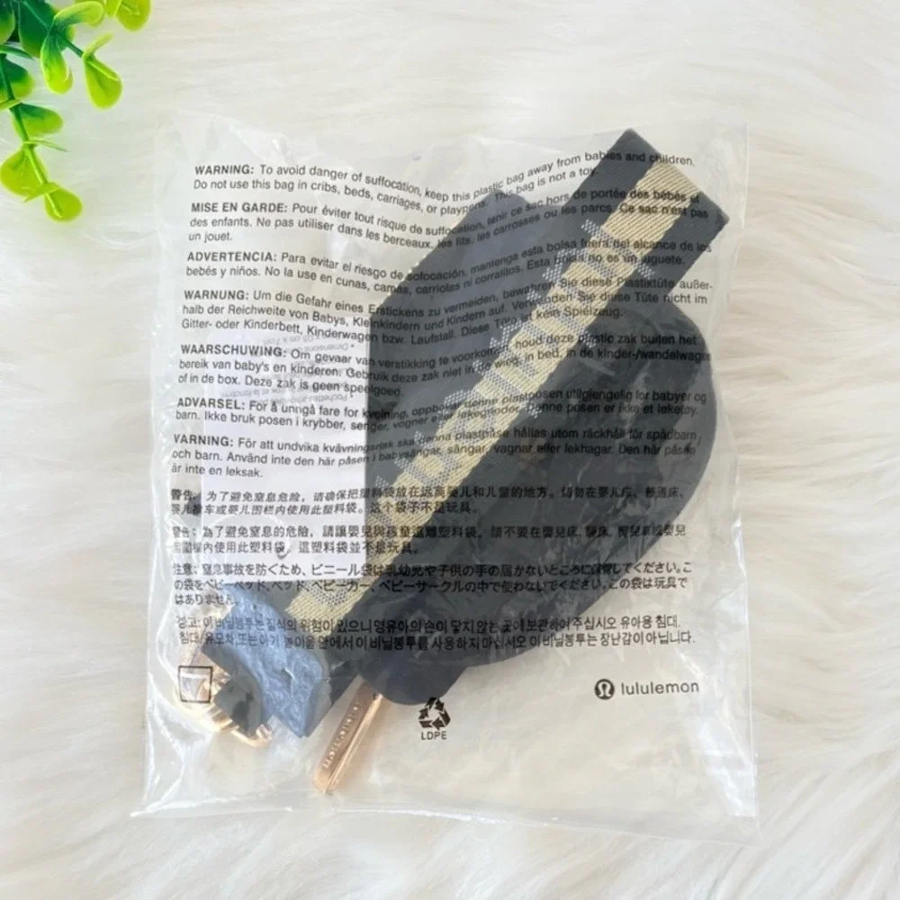 Lululemon Dual Pouch‎ Wristlet in Black & Gold