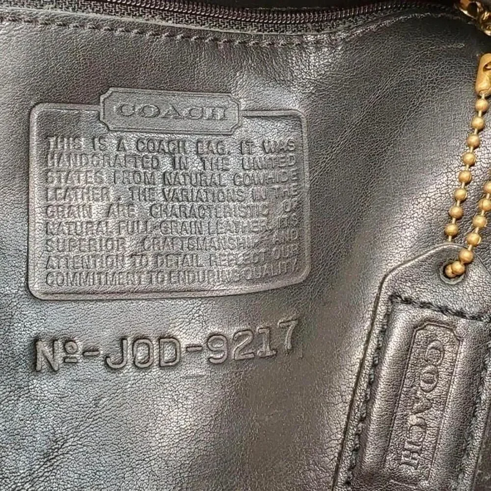 Coach black perforated