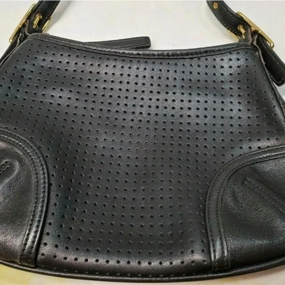 Coach black perforated
