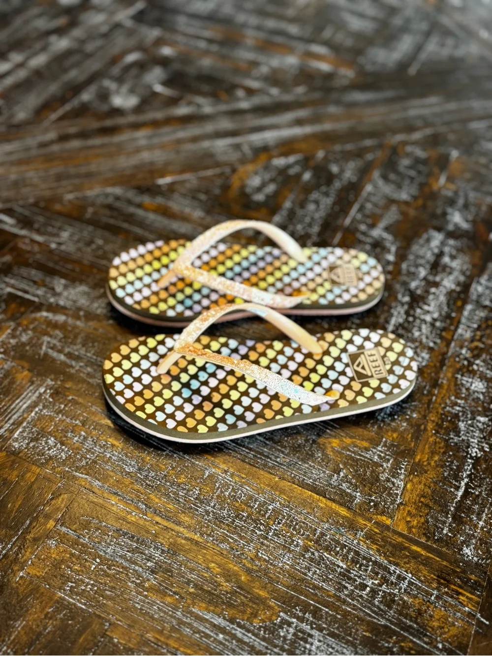Reef Kids Flip Flops in Multicolor Heart Print with Pink Glitter Straps