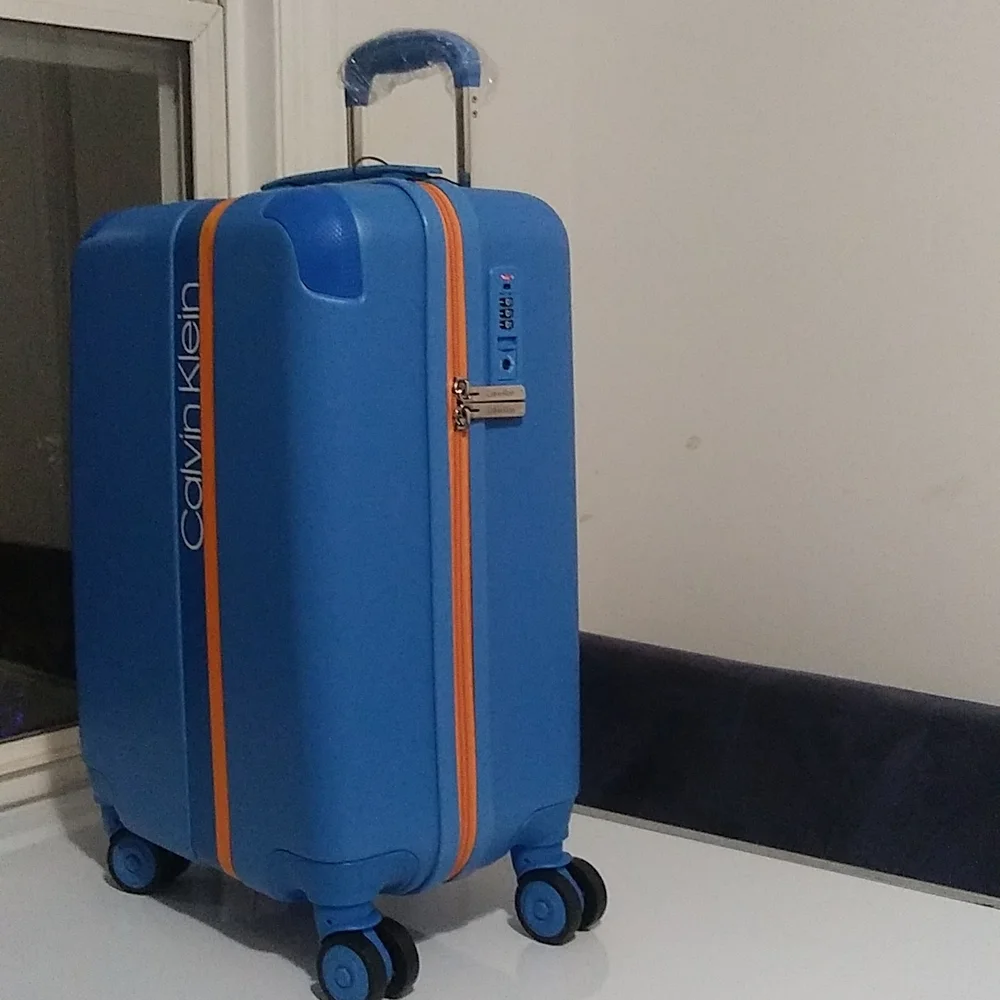 Calvin Klein Avenue Lanes Hardside Spinner Luggage with TSA Lock, Sky Bl…