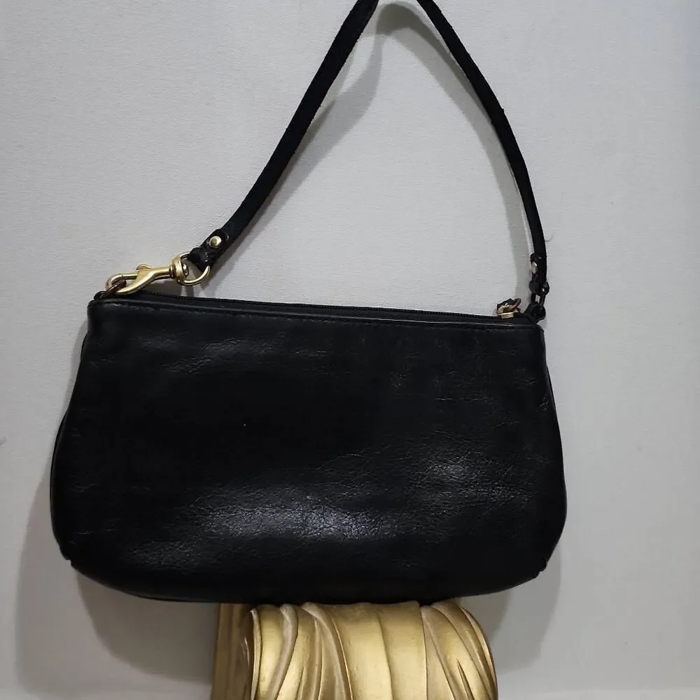 Coach features wristlet