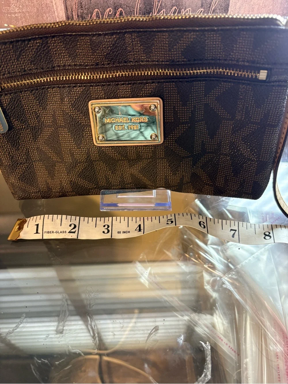 Michael Kors Brown Logo MK Wristlet with Gold Plate