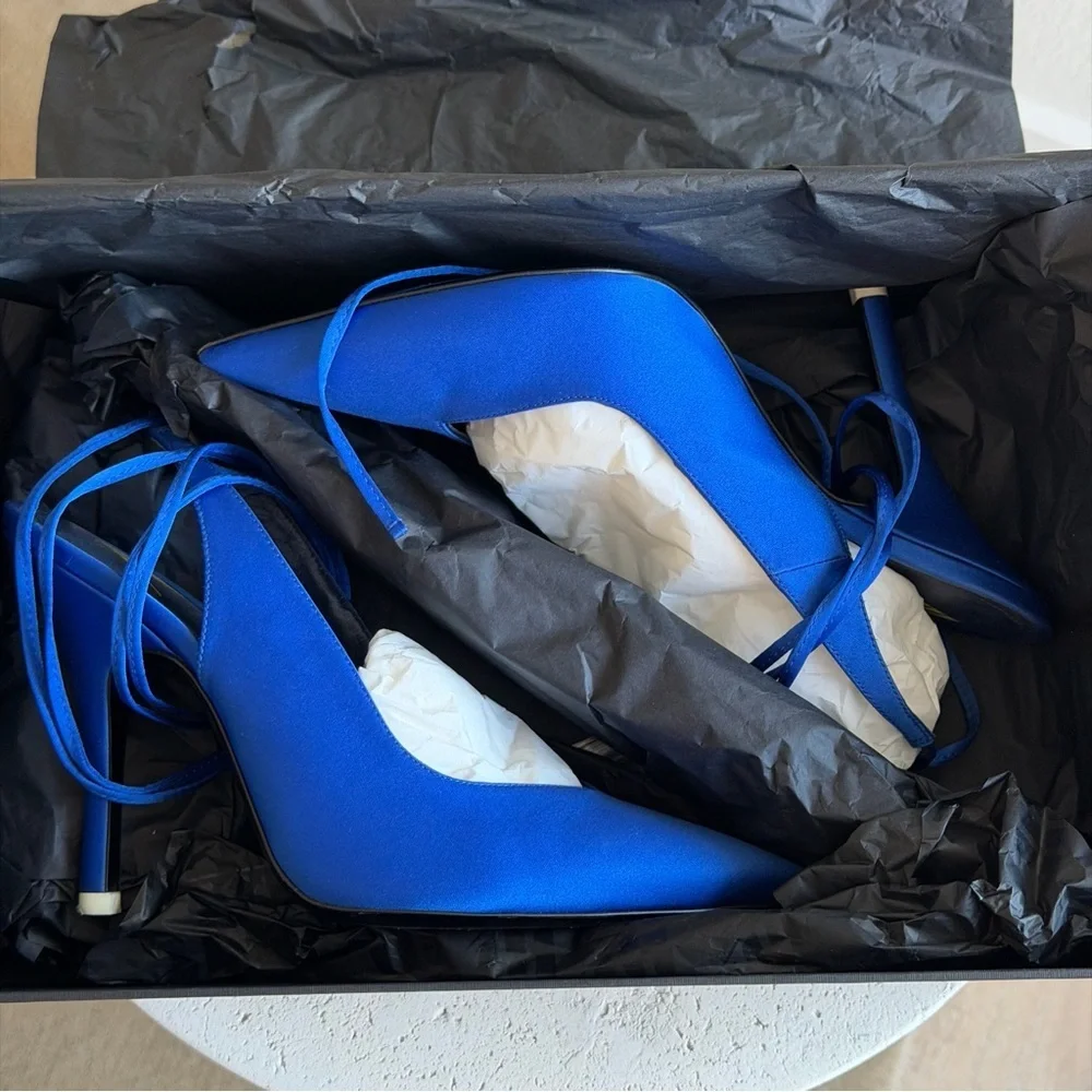 The Attico wear turning box