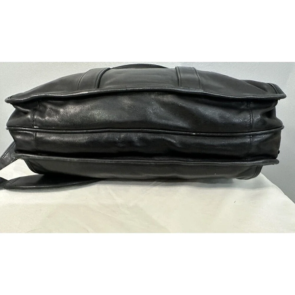 Tumi black leather