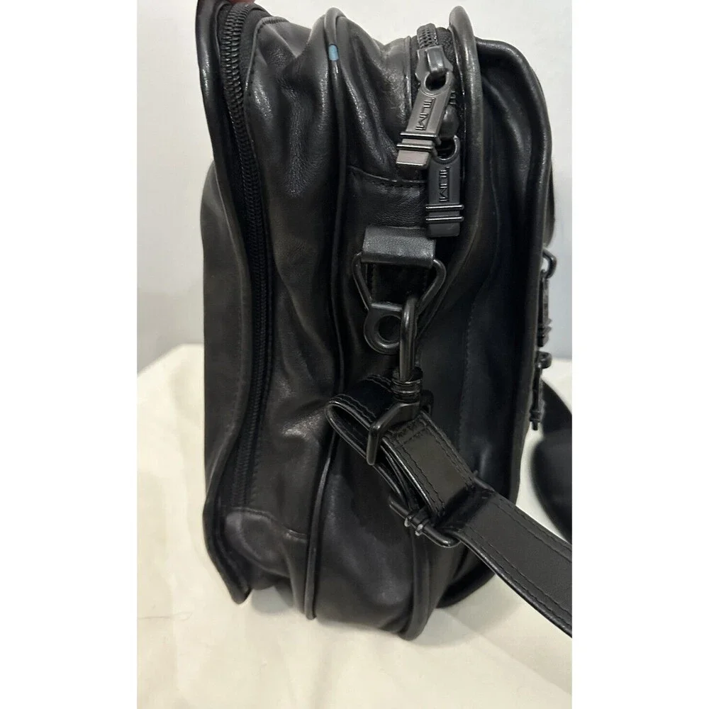 Tumi black leather