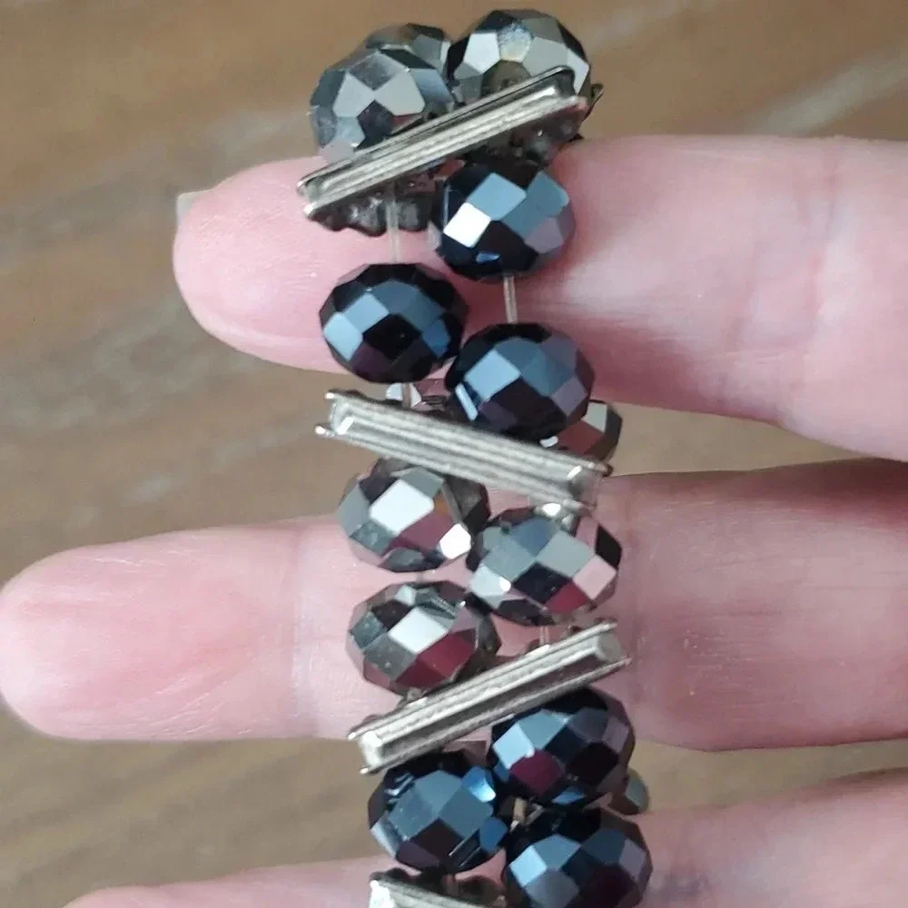 None silver black bracelet