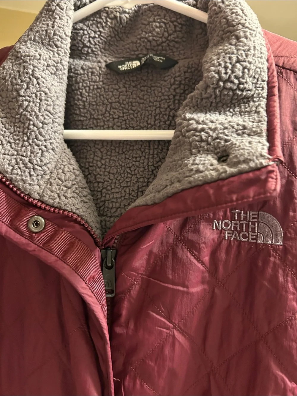 The North Face wine colored