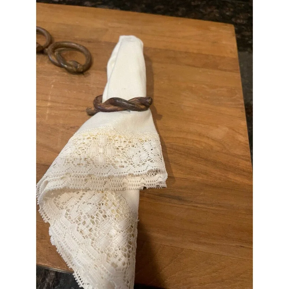 Set of 8 hand-forged iron napkin rings