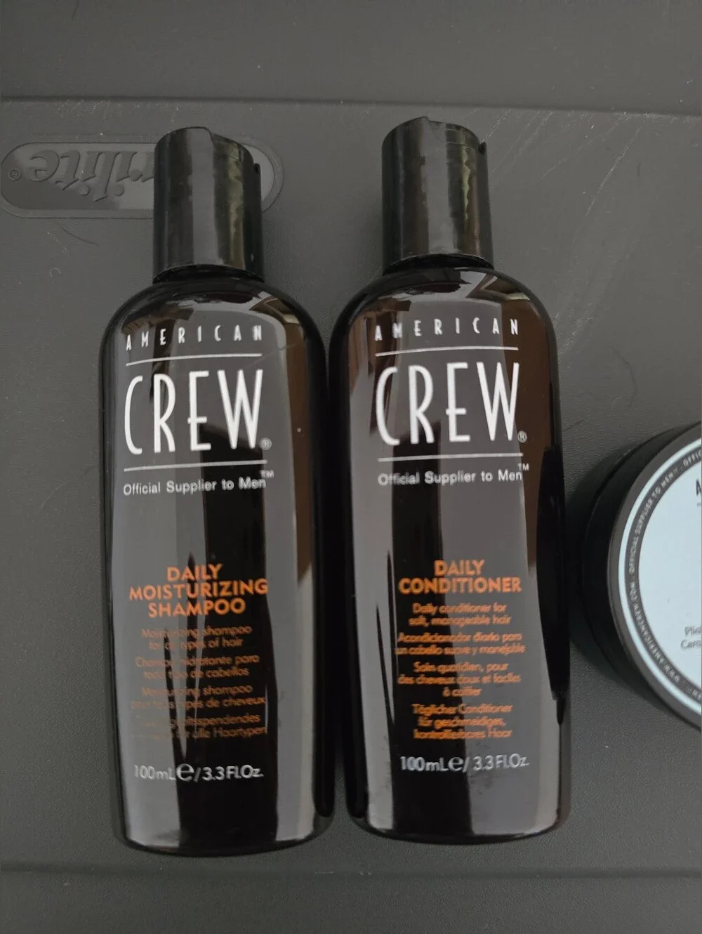 American Crew travel branded styling