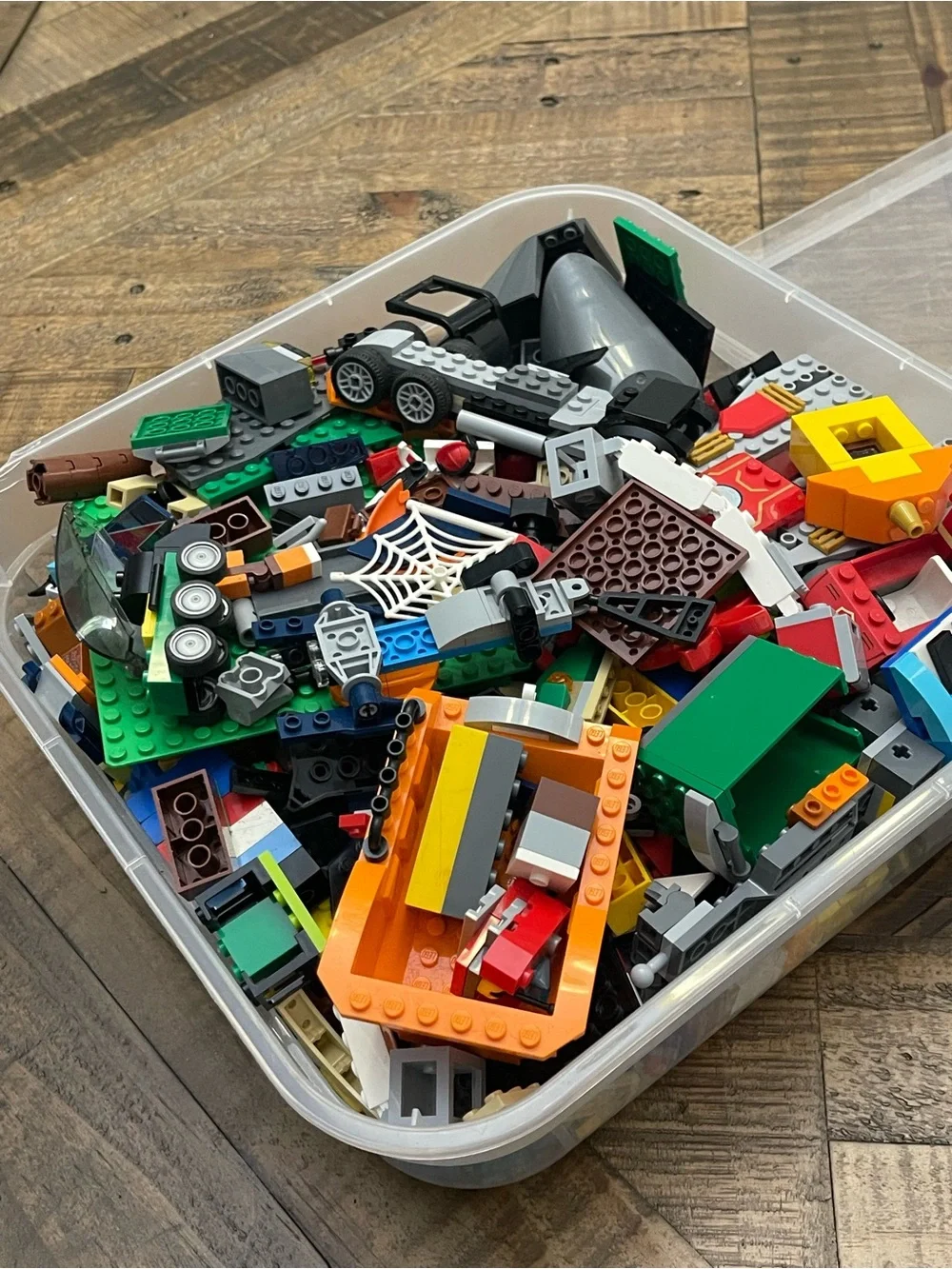 mixed assortment of LEGO brand bricks, plates, and specialty components