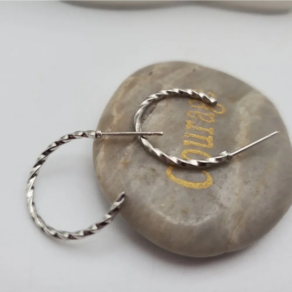 Silver tone twist‎ hoop earrings