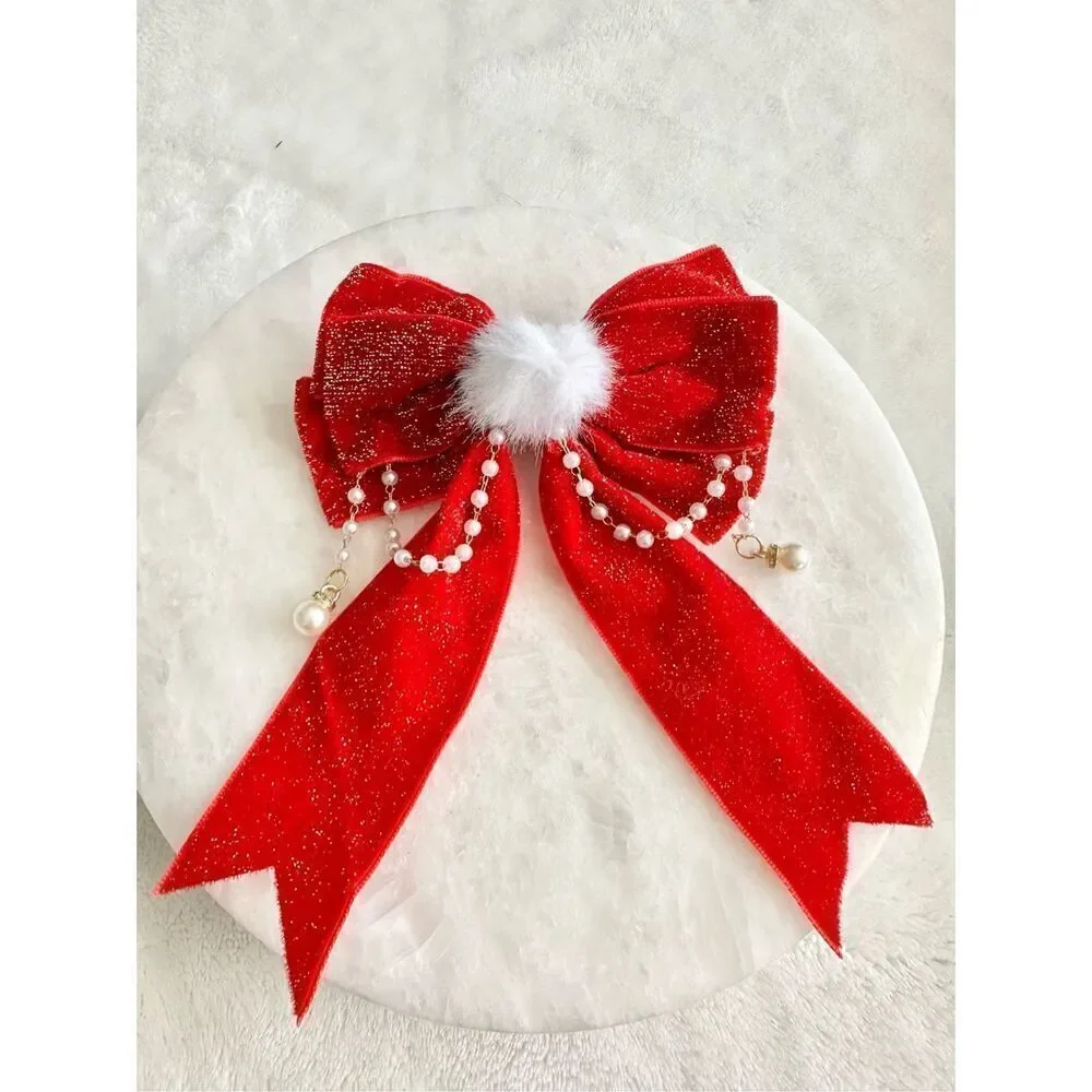Bright red Christmas pom-pom with pearl detail bow ￼