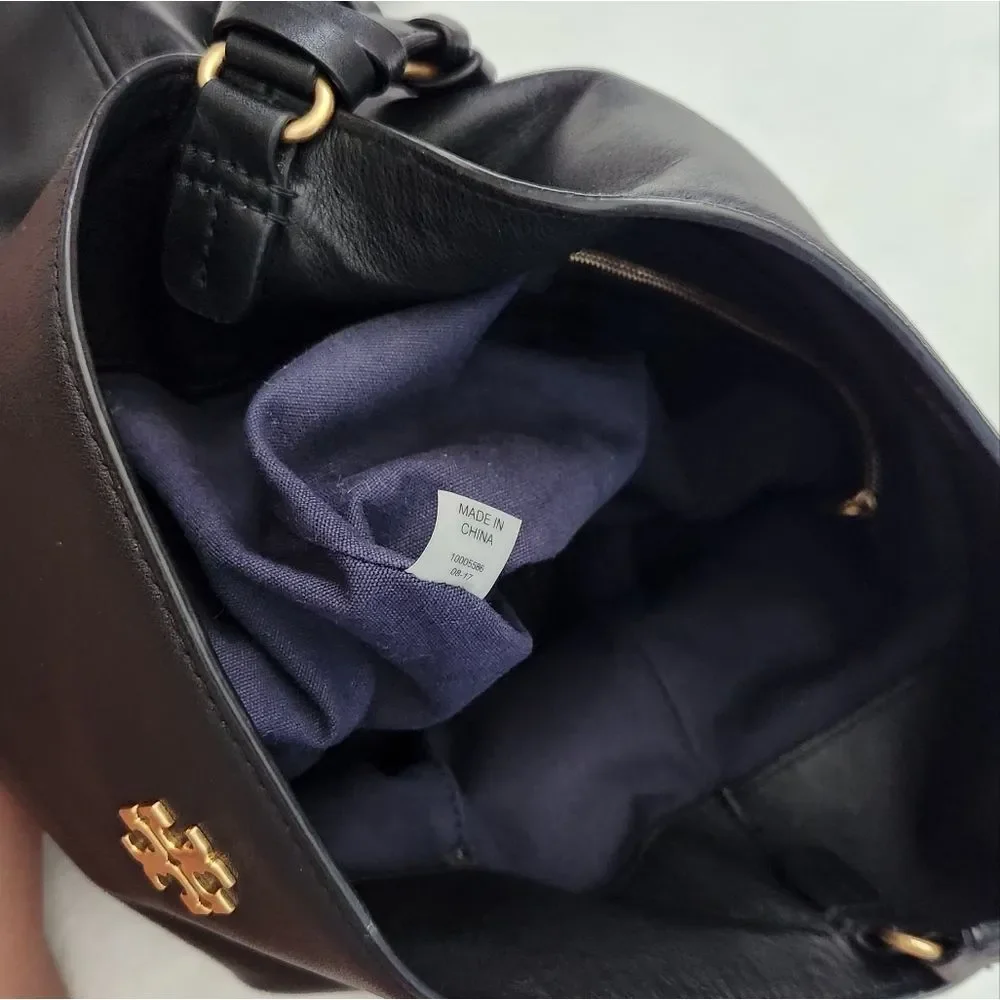 Tory Burch reposhing this
