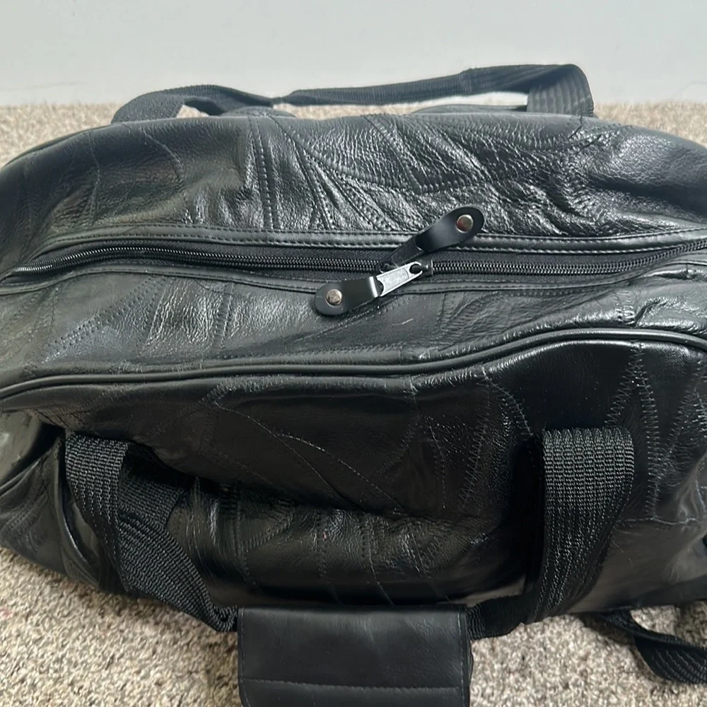 Black leather Bay Area celebrity/AM golf tournament bag