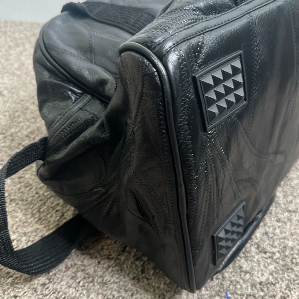 Black leather Bay Area celebrity/AM golf tournament bag