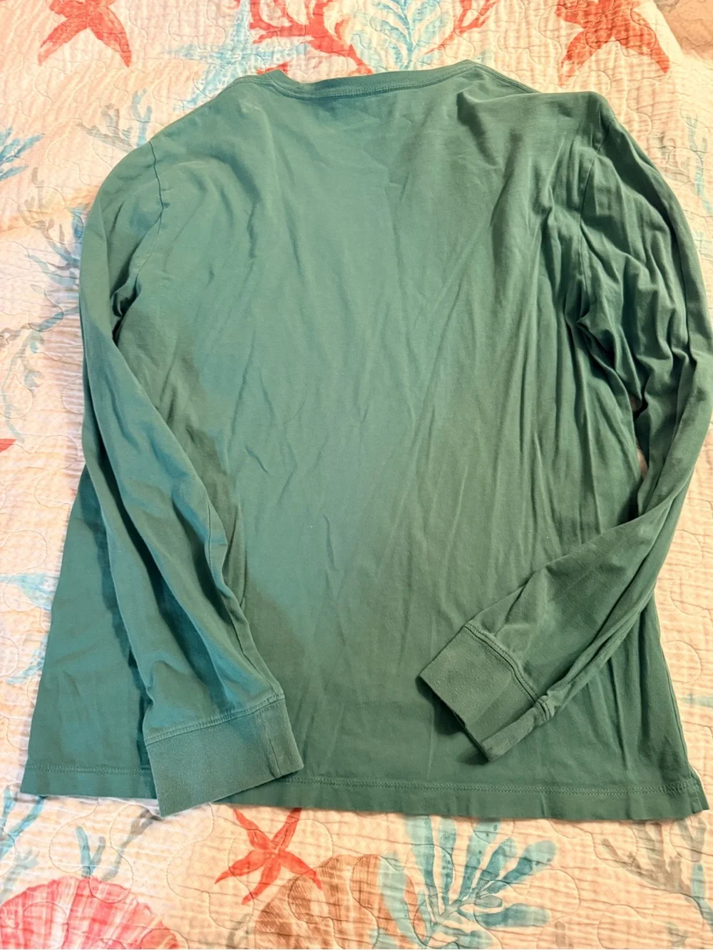 J. Crew sleeve reading
