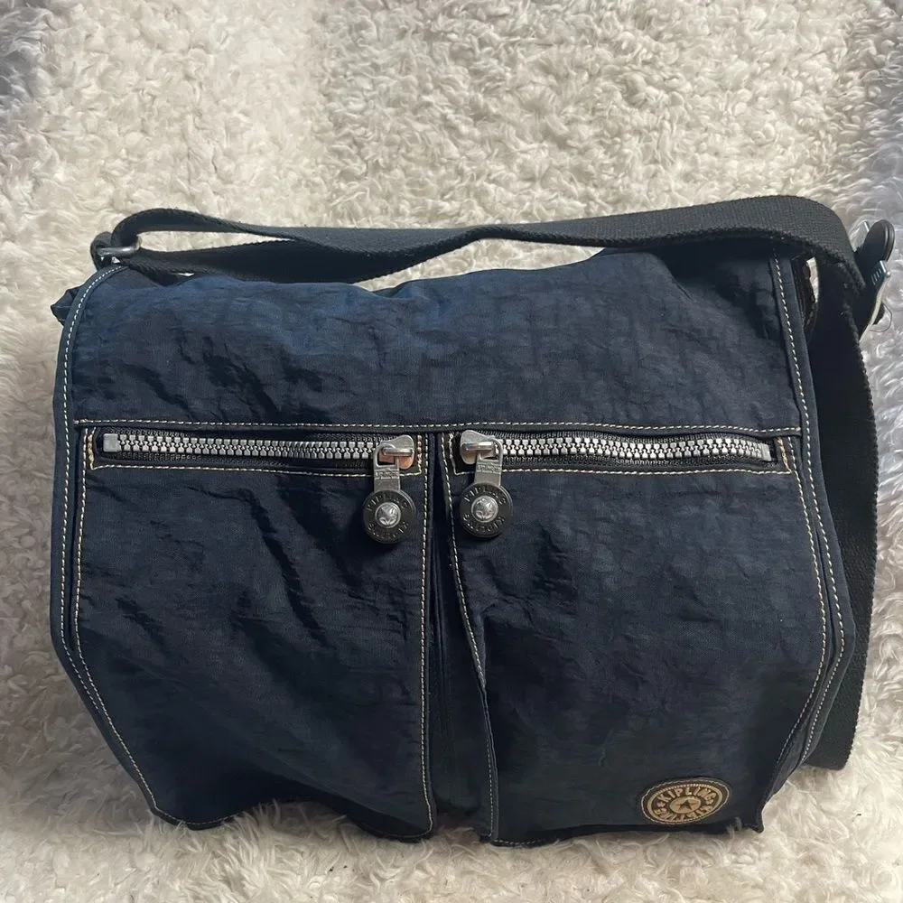 Kipling Nylon Expandable Navy Blue Large Messenger Bag  Key Clip. Black strap .
