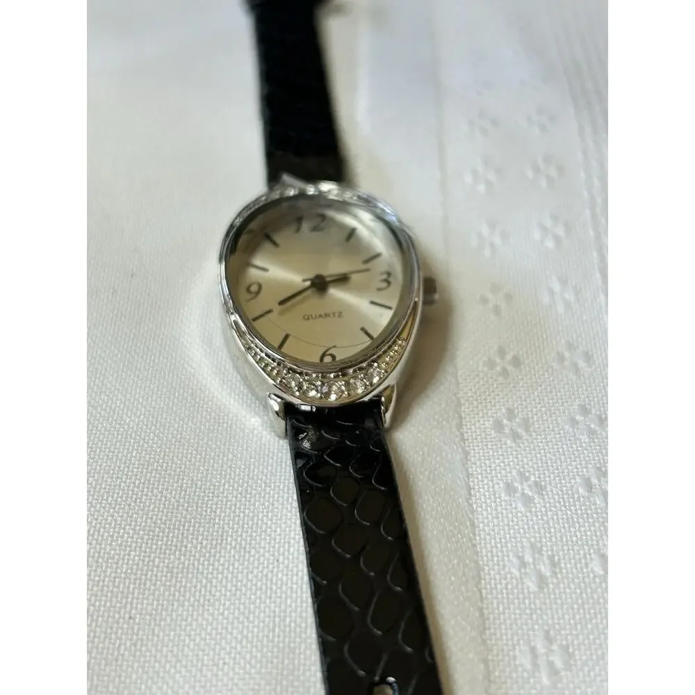 Women's Silver Analog Watch New Battery Arabic Numerals Oval Dial 2010s Casual