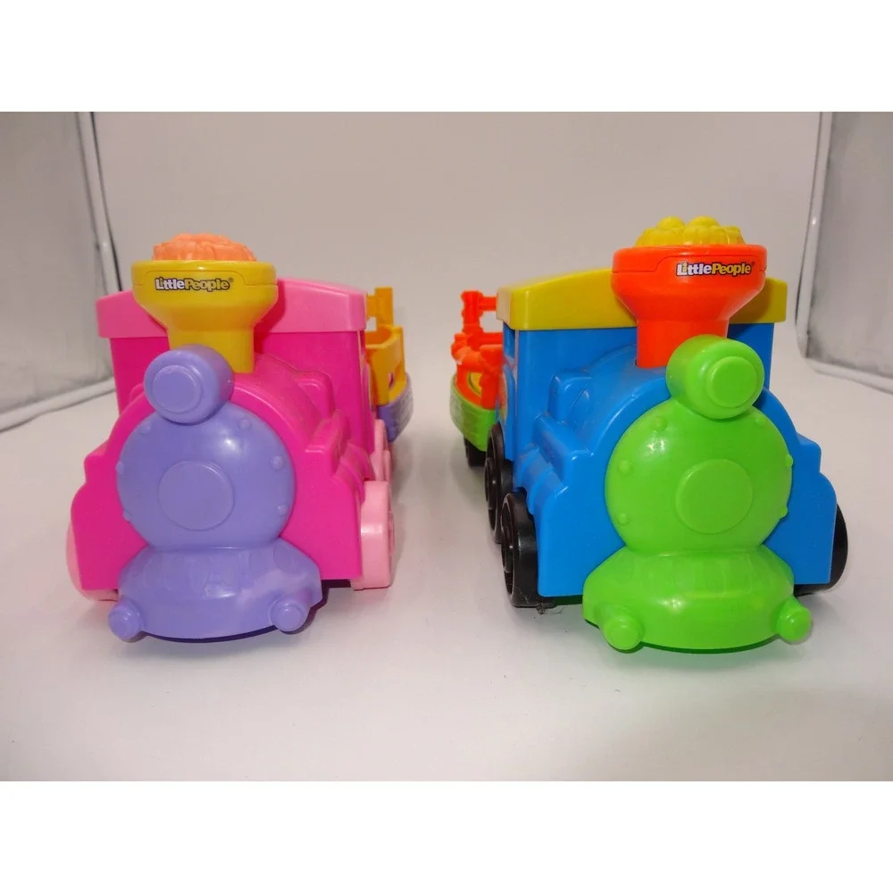 Fisher Price Little People Pink Musical Zoo Train and Musical Safari Train Set