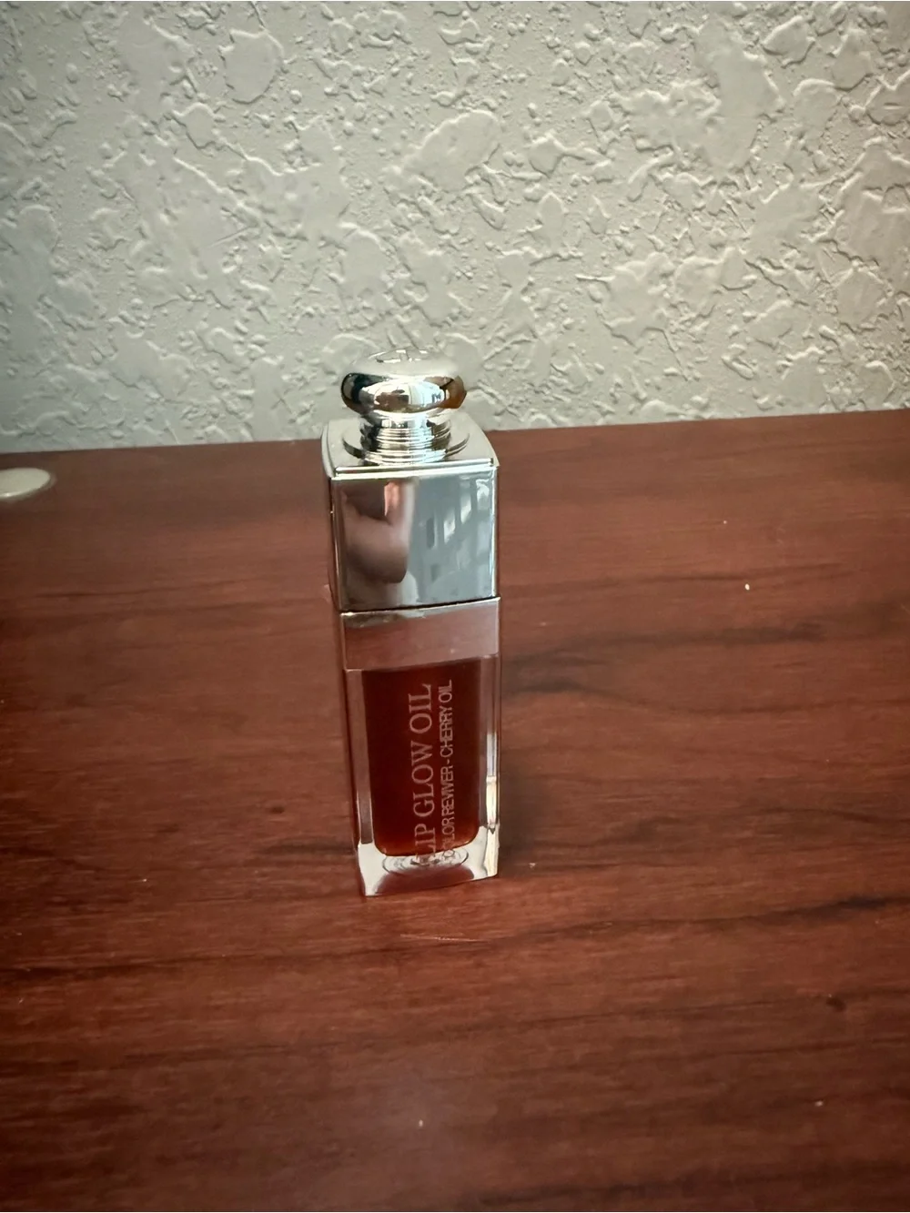 Dior Lip Glow Oil in Deep Brown with Silver Cap