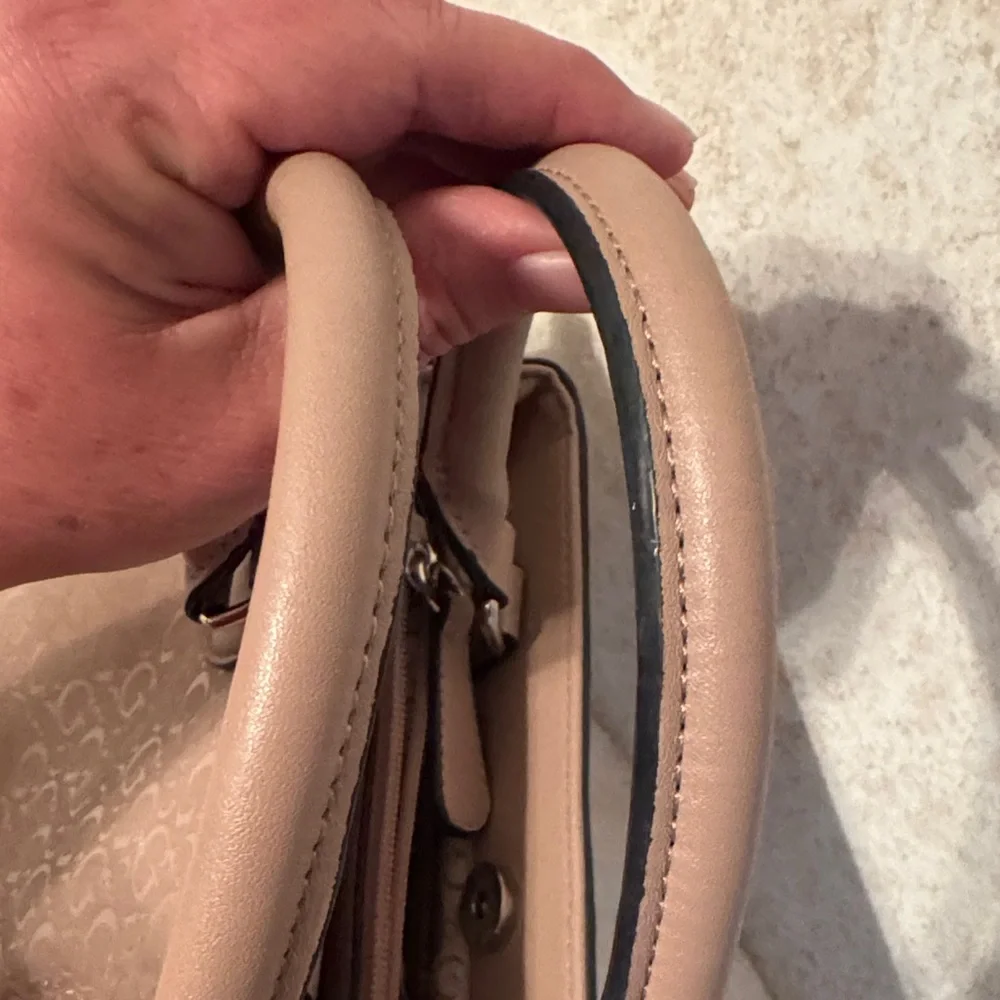 GUESS Beige Satchel Bag with crossbody strap.