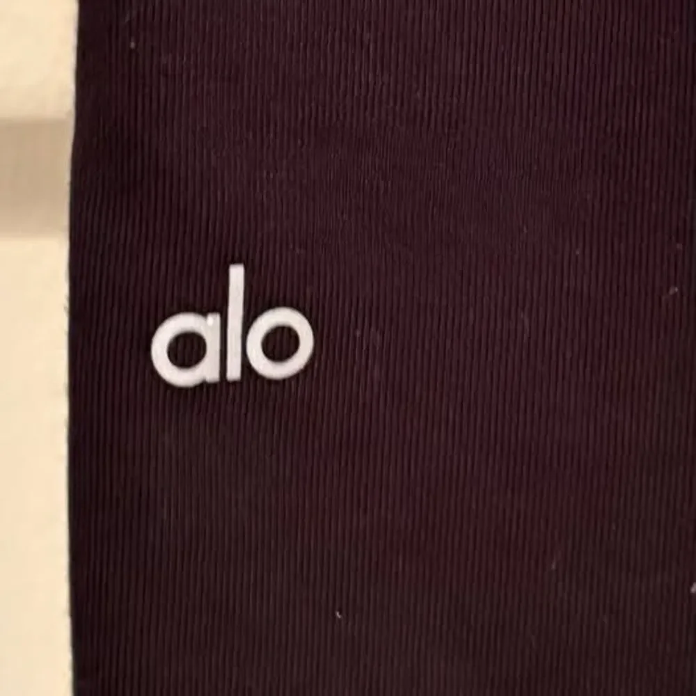 Alo Yoga Courtside Tearaway Snap Pants in Black