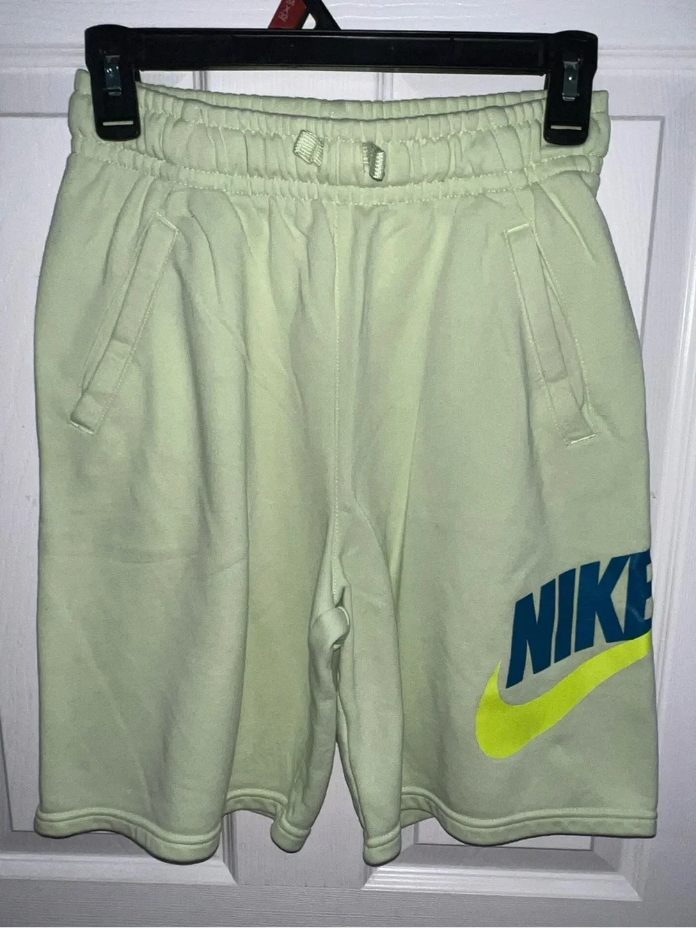 Nike Boys Shorts Youth XL Green Sweat Shorts SportsWear w Nike blue Logo design.