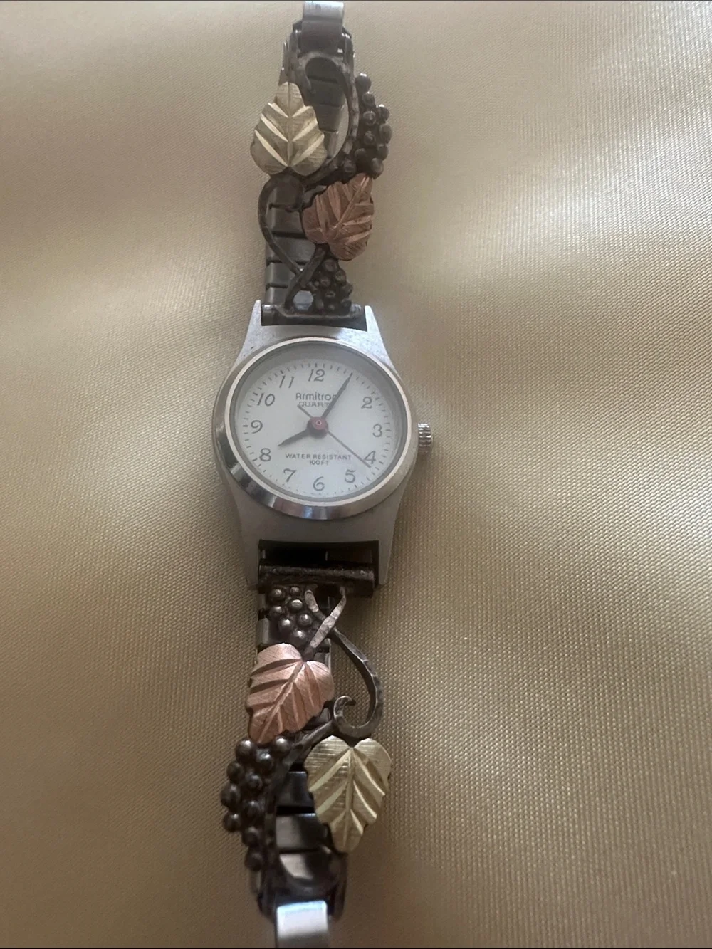 Armitron Tri-Tone Leaf Bracelet Watch in Silver, Gold, and Rose