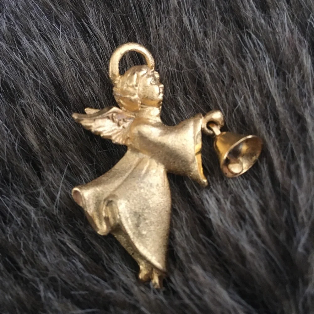 Vintage XOXO matte gold tone angel w/bell brooch