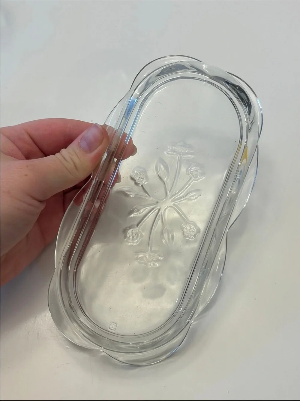 Anchor Hocking Savannah butter dish features a pressed clear glass design flower