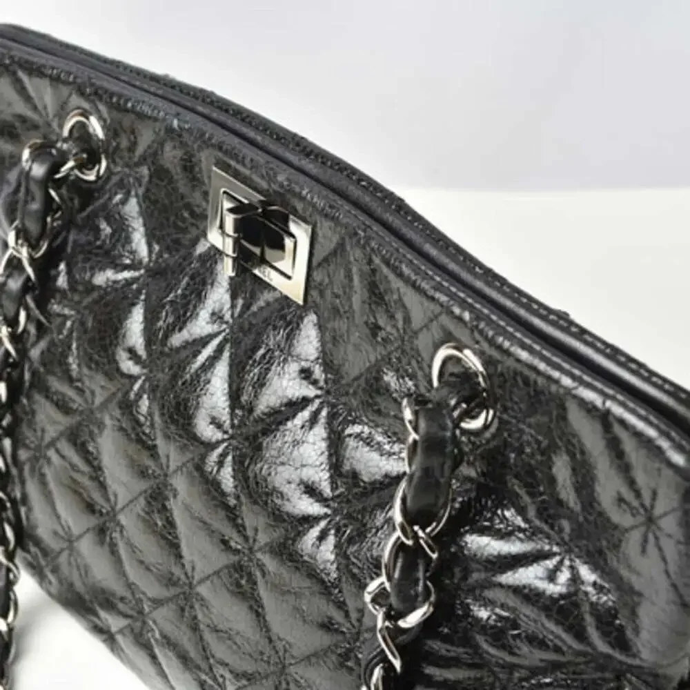 CHANEL black leather