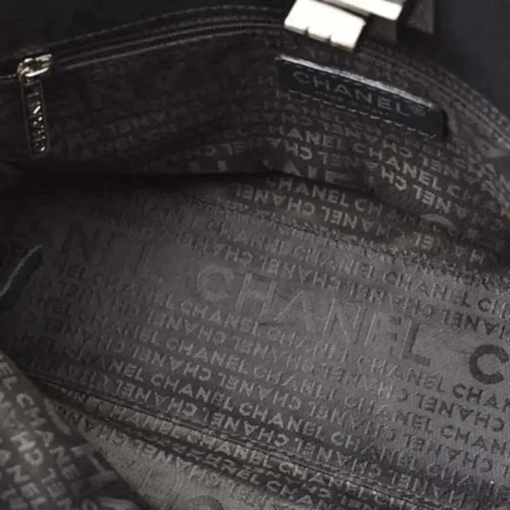 CHANEL black leather