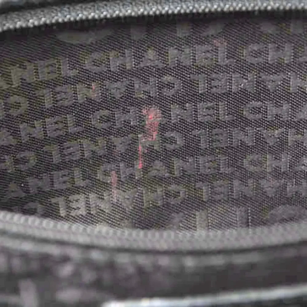 CHANEL black leather