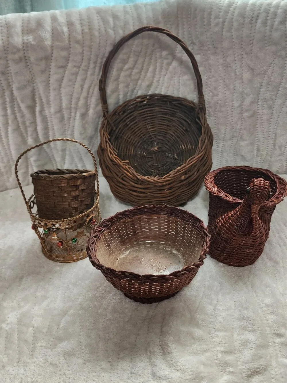 4 Wicker Baskets, Various sizes.
