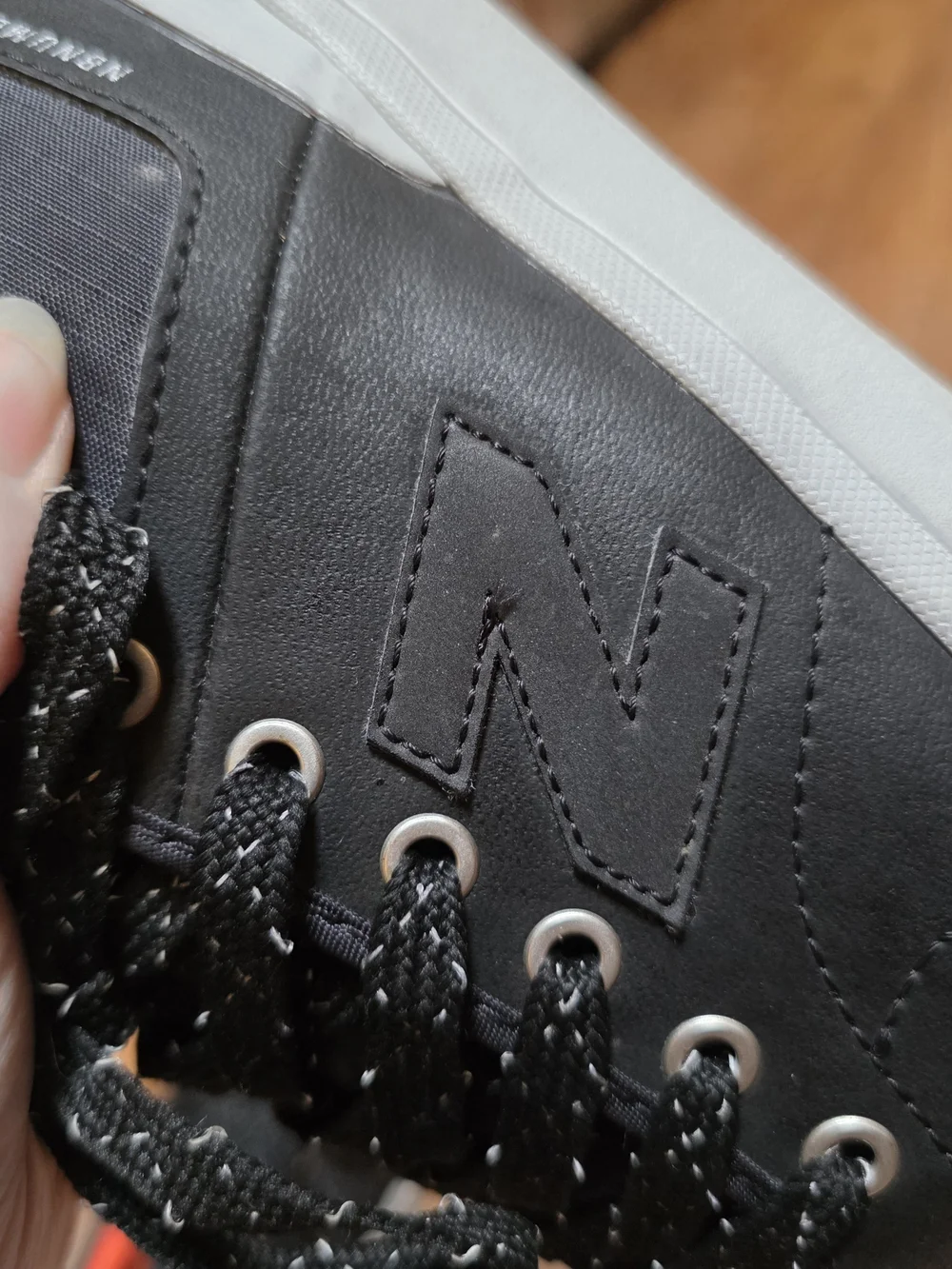 New Balance black leather