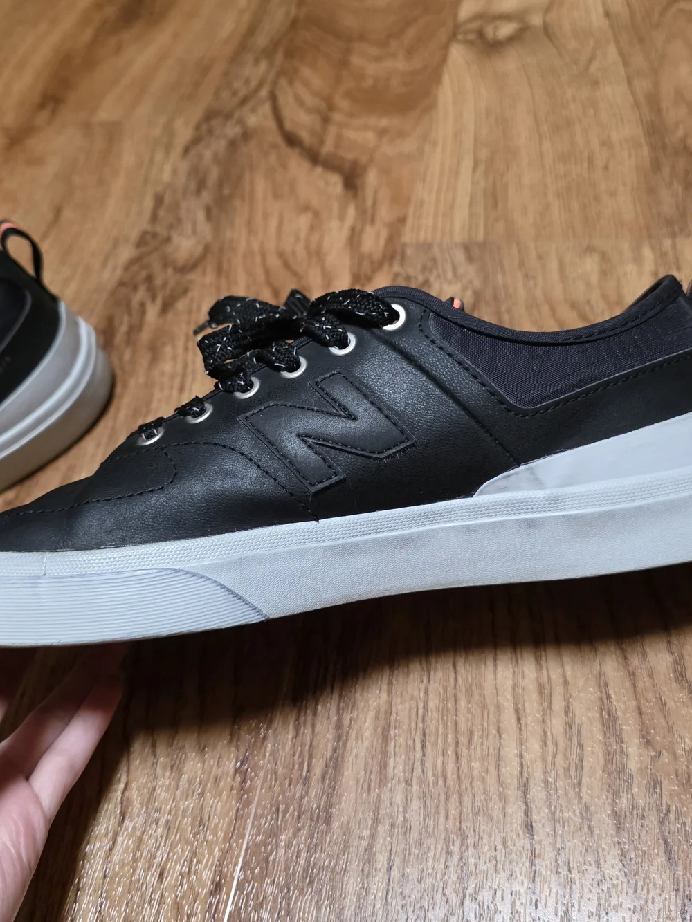New Balance black leather